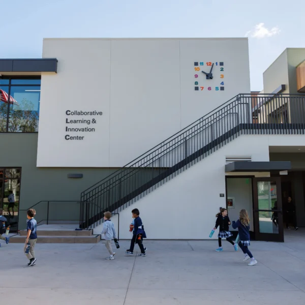 Curtis School Collaborative Learning & Innovation Center (CLIC) exterior in California, with students walking across campus outside the modern academic building.